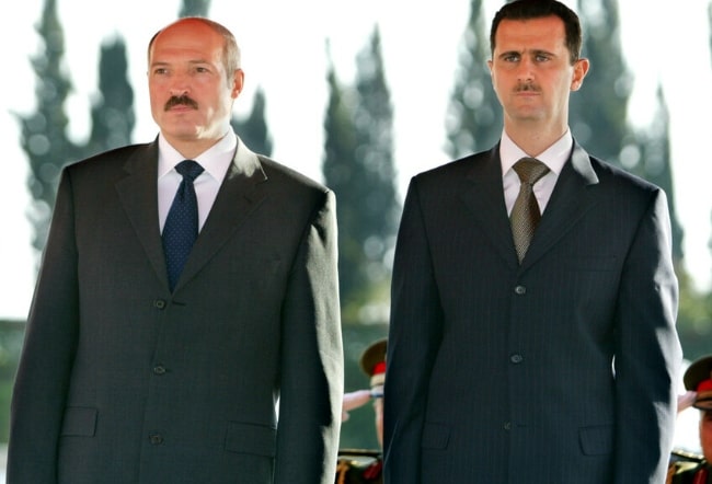 Alexander Lukashenko (Left) as seen alongside Syrian politician Bashar al-Assad during a state-visit to Syria in December 2003