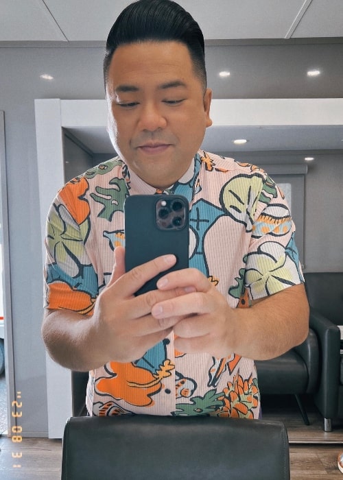 Andrew Phung as seen while taking a mirror selfie in 2023