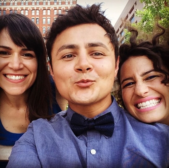 Arturo Castro as seen while pouting for a selfie with Abbi Jacobson (Left) and Ilana Glazer (Right) in January 2024