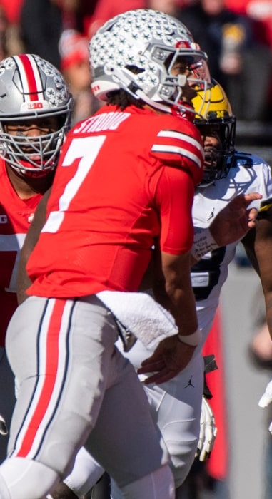 C. J. Stroud as a quarterback with the Ohio State Buckeyes during a game against the Michigan Wolverines in Columbus, Ohio on November 26, 2022
