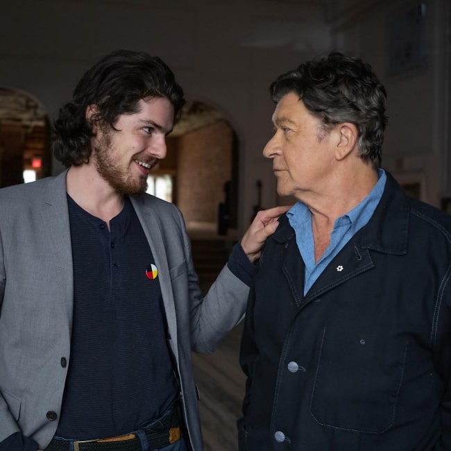 Daniel Roher (Left) as seen in a picture with Robbie Robertson