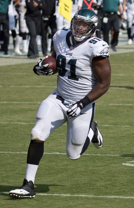 Fletcher Cox as seen with the Philadelphia Eagles running back a fumble for a touchdown during a game against the Washington Redskins on September 10, 2017