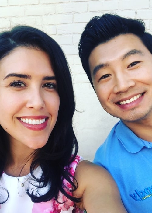 Nicole Power as seen while smiling in a picture with her Kim's Convenience co-star Simu Liu in March 2020